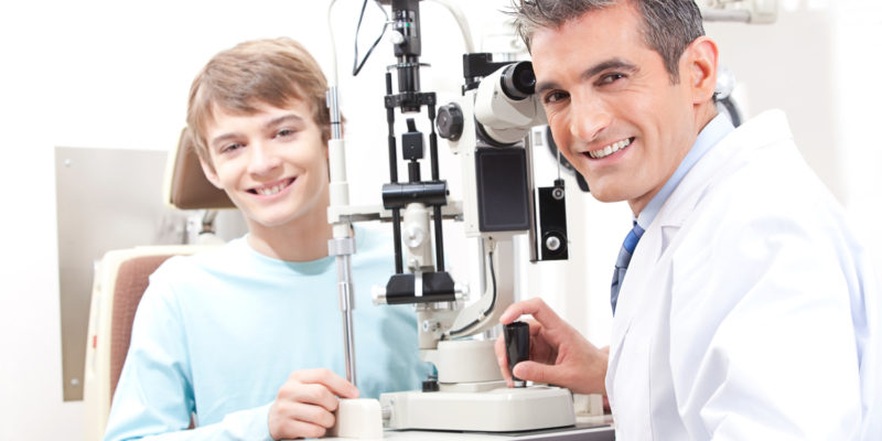 Optometrist And Pateint In Clinic